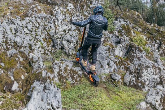 A clean, side-profile shot of the Kukirin G3 Pro on a paved, upward-sloping road to visually represent hill-climbing power