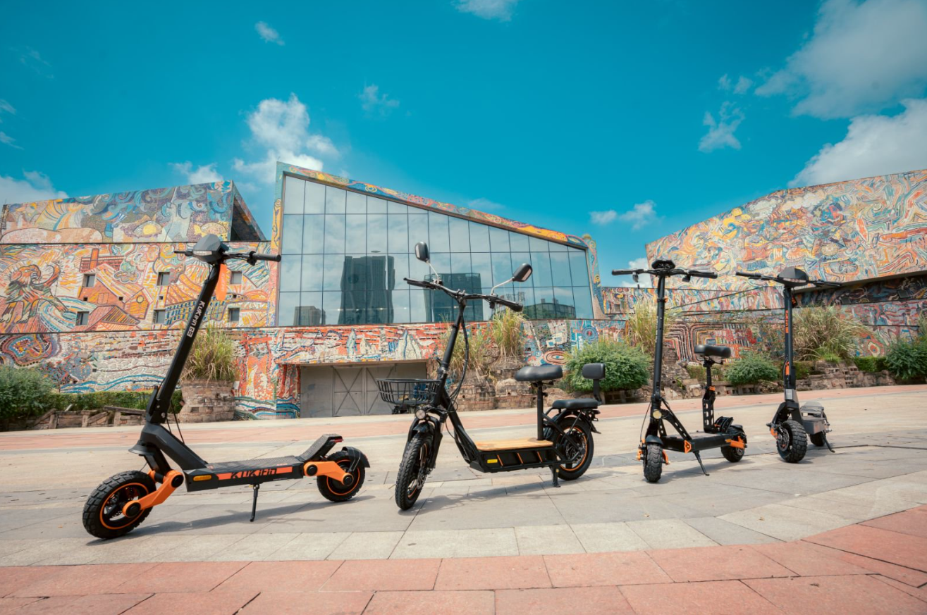 Electric scooters displayed side by side on a street