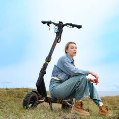 Kukirin T3 adult electric scooter displayed on grass, long-range scooter for adults